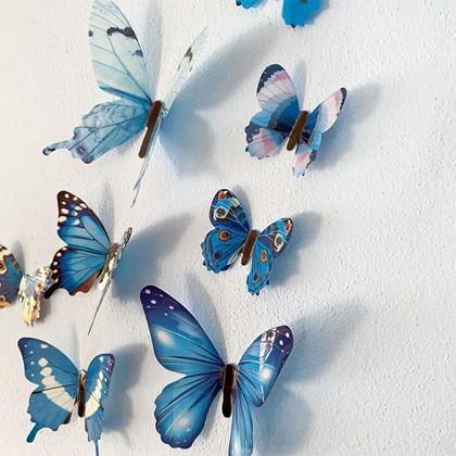 Obrazek z Zestaw świecących motyli na ścianę - niebieski